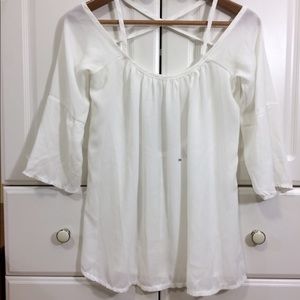 White cut out back sheer flare blouse
